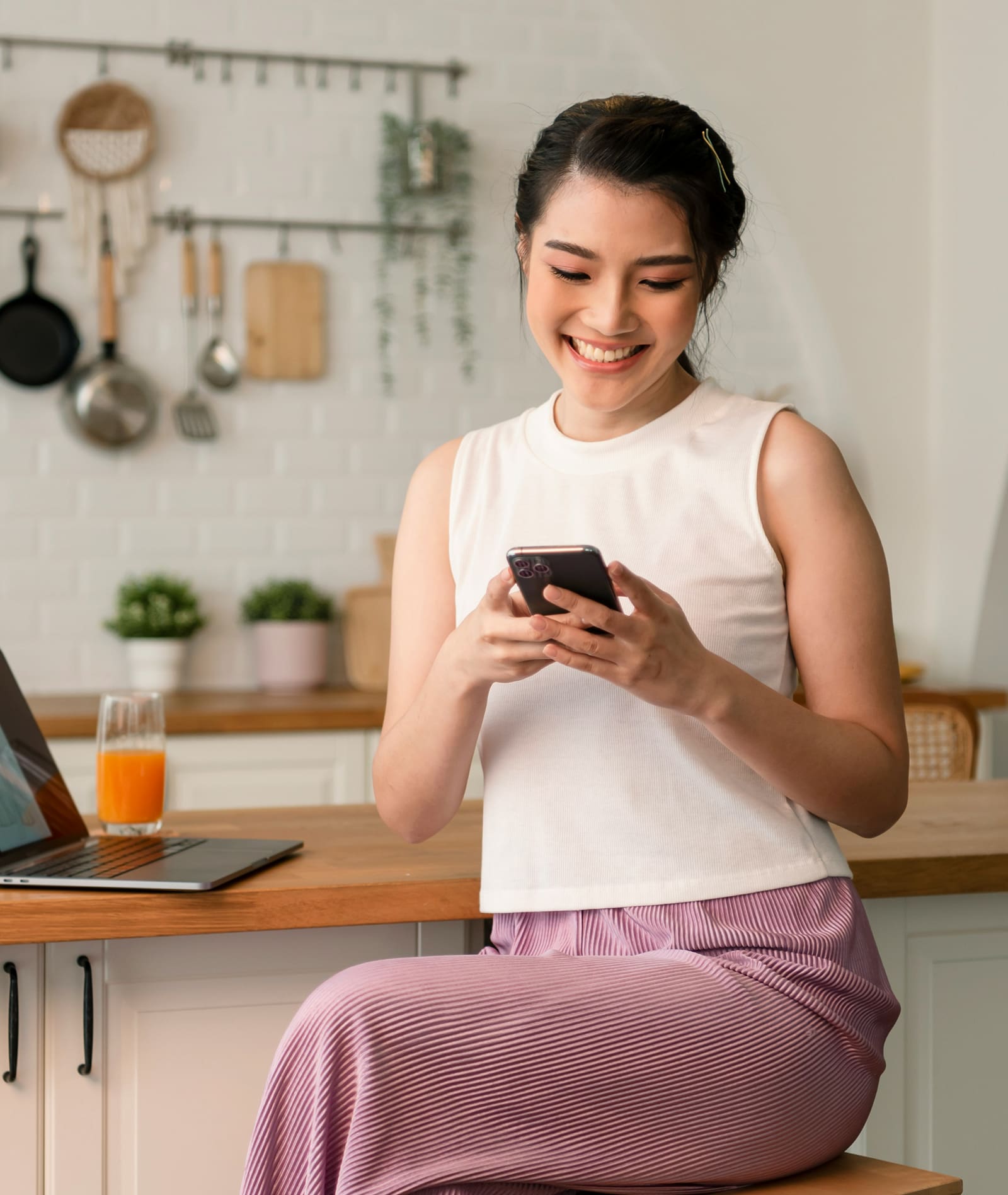 Small business owner managing payments from a smartphone