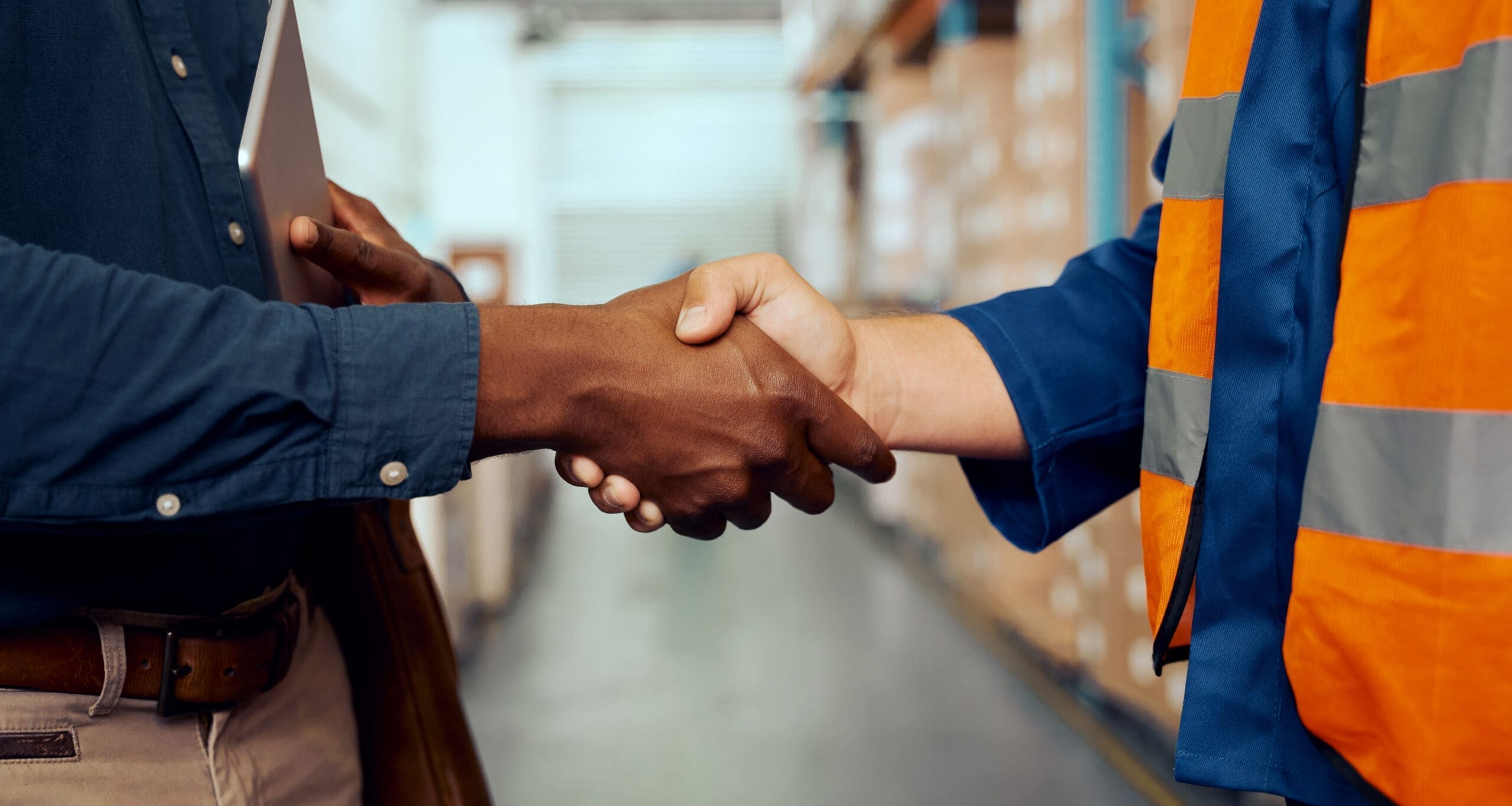 Workers shaking hands