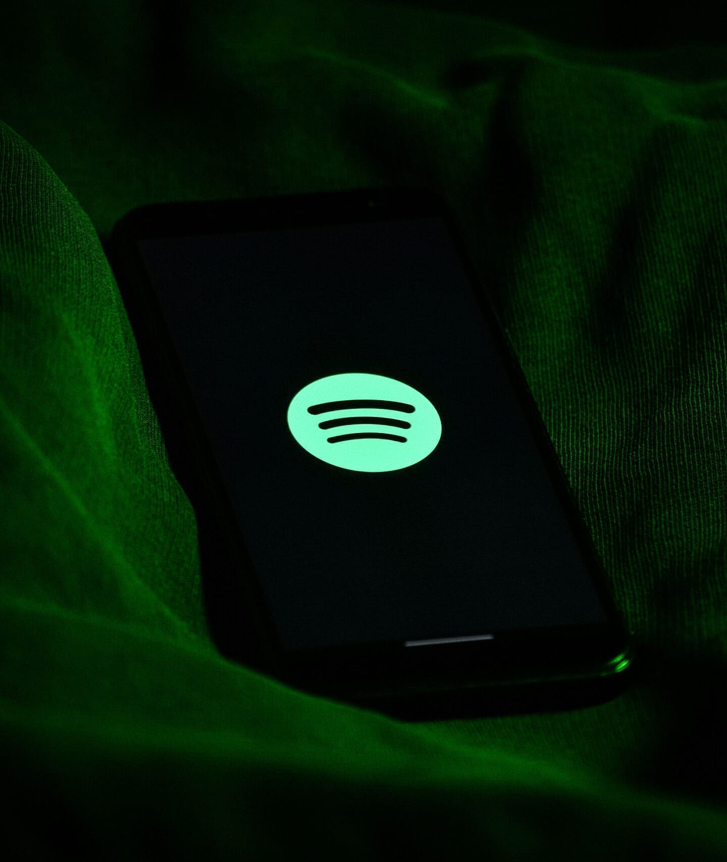 Phone showing Spotify app logo
